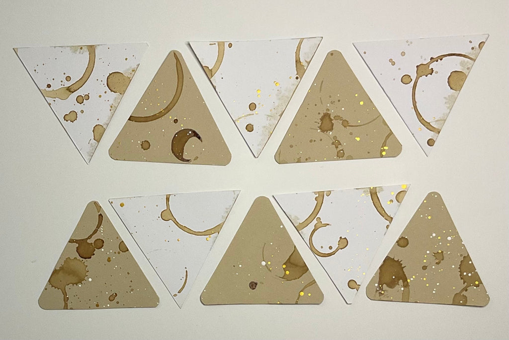 Square tin and x10 coffee stained triangle shaped Tiles